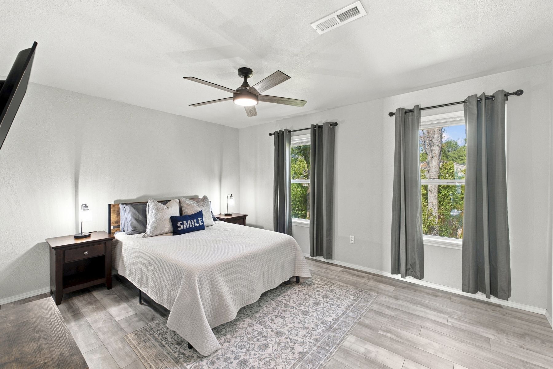 Unit A primary bedroom with king bed