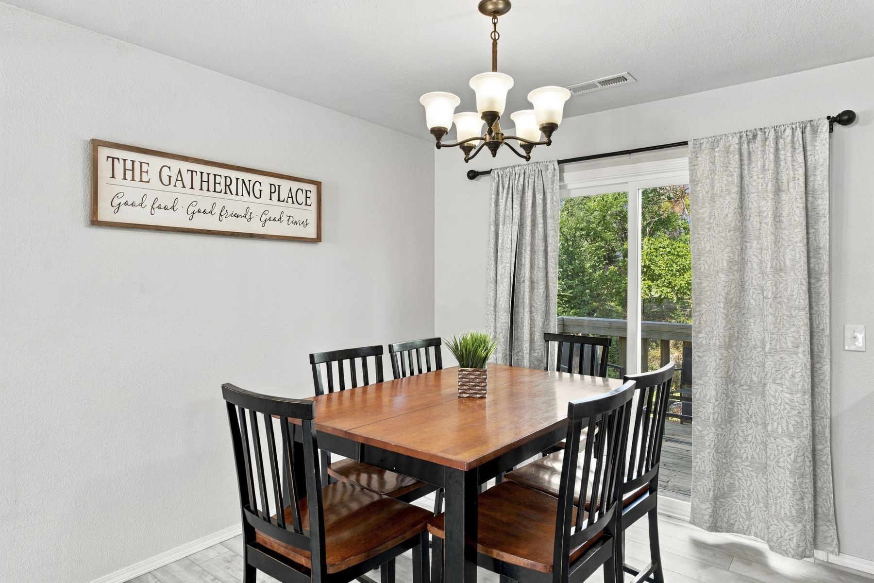 Unit A dining area with sliding door to the deck