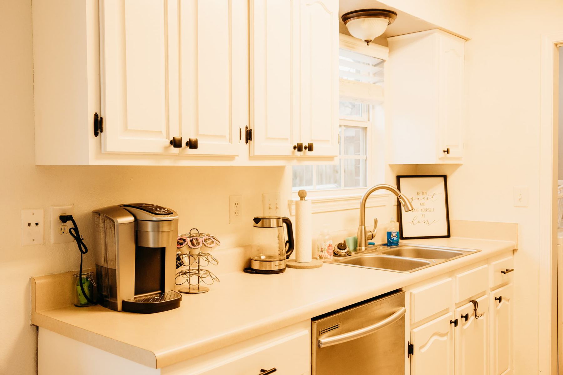 Camellia A kitchen with coffee station